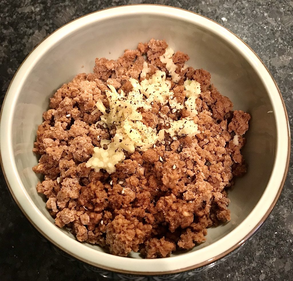 marinating gardein beef crumbles with ginger, Shaoxing wine, and ginger